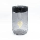 Frasco de vidrio gris ahumado con tapa negra, capacidad de 660 ml, estilo moderno.